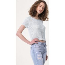 Niebieska Bluzka Fibrousness. Niebieskie bluzki damskie Born2be, s, z aplikacjami, z bawełny, z okrągłym kołnierzem. Za 39,99 zł.