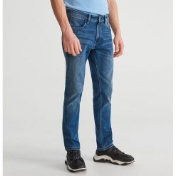 Jeansowe spodnie slim z recyklingu - Granatowy. Niebieskie spodnie męskie Reserved, m, bez wzorów, z jeansu. Za 169,99 zł.