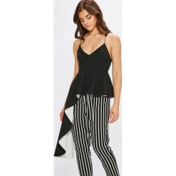 Missguided - Top. Czarne bluzki damskie marki Missguided, bez wzorów, z poliesteru, z asymetrycznym kołnierzem. W wyprzedaży za 179,90 zł.