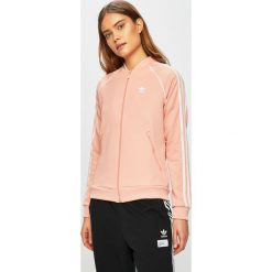 Adidas Originals - Bluza. Pomarańczowe bluzy damskie adidas Originals, z nadrukiem, z elastanu, bez rękawów, bez kaptura. W wyprzedaży za 219,90 zł.