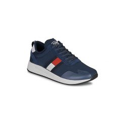 Buty Tommy Jeans FLAG FLEXI TOMMY JEANS SNEAKER. Niebieskie trampki męskie Tommy Jeans, bez wzorów, z jeansu, bez zapięcia. Za 399,00 zł.