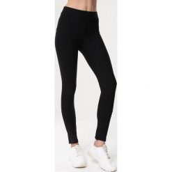 Czarne Legginsy Be Able. Czarne legginsy damskie Born2be, xl, bez wzorów, z dzianiny. Za 79,99 zł.