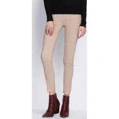 Beżowe Jegginsy With Magic. Brązowe jeansy damskie Born2be, na lato, xl, z dzianiny. Za 79,99 zł.
