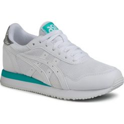 Buty ASICS - Tiger Runner 1192A188 White/White 100. Białe półbuty damskie Asics, na co dzień, bez wzorów, ze skóry ekologicznej, bez obcasa, na płaskiej podeszwie, bez zapięcia. Za 249,00 zł.