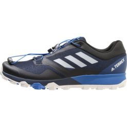 Adidas Performance TERREX Obuwie do biegania Szlak conavy/grey/blue. Niebieskie buty sportowe męskie marki adidas Performance, z tworzywa sztucznego, bez zapięcia, do biegania. Za 499,00 zł.