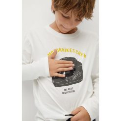 Mango Kids - Longsleeve dziecięcy Rider 110-152 cm. Białe t-shirty chłopięce Mango Kids, z nadrukiem, z bawełny, bez rękawów. Za 49,99 zł.