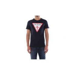 T-shirty z krótkim rękawem Guess M92I17 K6XNO. Niebieskie t-shirty męskie Guess, s, z aplikacjami, bez kołnierzyka, krótkie. Za 118,13 zł.
