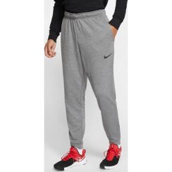 Nike Dri-FIT Spodnie dresowe Szary. Szare spodnie męskie Nike, m, bez wzorów, z poliesteru. Za 171,95 zł.