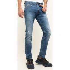 Jeansy Straight Leg TOMMY HILFIGER Denton MW0MW12667. Niebieskie spodnie męskie TOMMY HILFIGER, m, bez wzorów, z elastanu. W wyprzedaży za 389,00 zł.