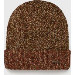 Dakine - Czapka. Pomarańczowe czapki męskie marki Dakine, na zimę, bez wzorów, z poliesteru. W wyprzedaży za 49,90 zł.