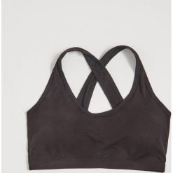 Sportowy top - Czarny. Czarne topy damskie Sinsay, m, bez wzorów, bez kołnierzyka. Za 24,99 zł.