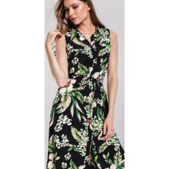 Czarna Sukienka Fluff Up. Czarne sukienki damskie Renee, s, bez wzorów, eleganckie, z klasycznym kołnierzykiem, bez rękawów, midi, koszulowe. Za 89,99 zł.