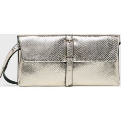 Calvin Klein - Torebka. Żółte listonoszki damskie Calvin Klein, bez wzorów, ze skóry ekologicznej, na ramię, bez dodatków. W wyprzedaży za 239,90 zł.