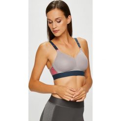 Triumph - Biustonosz. Różowe biustonosze sportowe Triumph, z haftami, z bawełny. W wyprzedaży za 159,90 zł.