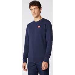 Wrangler Bluza Niebieski. Niebieskie bluzy męskie Wrangler, xxl, bez wzorów, z bawełny, bez kołnierzyka, bez rękawów, bez kaptura. Za 274,95 zł.