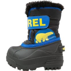 Sorel SNOW Śniegowce black/super blue. Niebieskie kozaki dziewczęce Sorel, z tworzywa sztucznego. Za 229,00 zł.