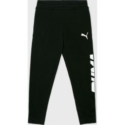 Puma - Spodnie dziecięce 140-176 cm. Czarne spodnie chłopięce Puma, z nadrukiem, z bawełny, sportowe. Za 159,90 zł.