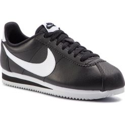 Buty NIKE - Classic Cortez Leather 807471 016 Black/White/Black. Czarne buty sportowe damskie Nike, na co dzień, bez wzorów, ze skóry ekologicznej, bez obcasa, na płaskiej podeszwie, bez zapięcia. W wyprzedaży za 319,00 zł.