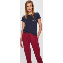 Tommy Jeans - Top. Niebieskie bluzki damskie Tommy Jeans, s, z nadrukiem, z bawełny, z okrągłym kołnierzem. W wyprzedaży za 139,90 zł.
