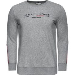 Bluza TOMMY HILFIGER Charlot WW0WW25164. Niebieskie bluzy damskie TOMMY HILFIGER, s, bez wzorów, z bawełny, bez rękawów, bez kaptura. W wyprzedaży za 249,00 zł.