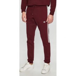 Adidas Originals - Spodnie. Brązowe spodnie męskie adidas Originals, na co dzień, s, bez wzorów, z bawełny, casualowe. Za 279,90 zł.