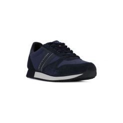 Trampki Tommy Hilfiger 403 ICONIC. Niebieskie trampki męskie marki TOMMY HILFIGER, bez wzorów, bez zapięcia. Za 282,71 zł.