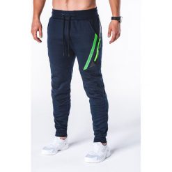 SPODNIE MĘSKIE DRESOWE P660 - GRANATOWE. Niebieskie spodnie dresowe męskie marki Ombre Clothing, s, z bawełny. Za 69,00 zł.