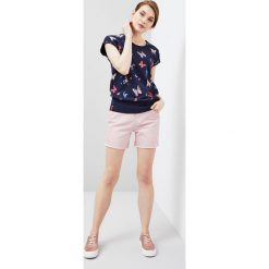 Bluza z nadrukiem. Niebieskie bluzy damskie Moodo, xs, z nadrukiem, bez rękawów, bez kaptura. Za 19,99 zł.