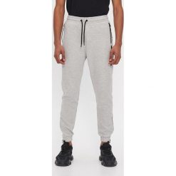 Spodnie typu jogger - Szary. Szare spodnie męskie House, s, bez wzorów. Za 119,99 zł.