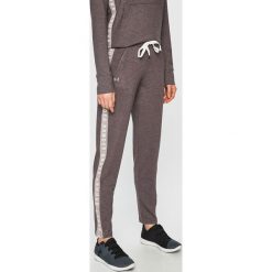 Under Armour - Spodnie. Szare spodnie damskie Under Armour, s, bez wzorów, z elastanu. W wyprzedaży za 159,90 zł.