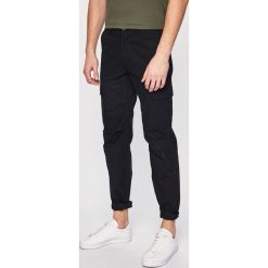 Dickies - Spodnie. Czarne spodnie męskie Dickies, na co dzień, bez wzorów, z bawełny, casualowe. W wyprzedaży za 179,90 zł.