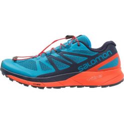 Salomon SENSE RIDE Obuwie do biegania Szlak fjord blue. Niebieskie buty do biegania męskie marki Salomon, z materiału. Za 589,00 zł.