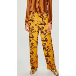 Scotch & Soda - Spodnie. Pomarańczowe spodnie damskie Scotch & Soda, s, z poliesteru. W wyprzedaży za 329,90 zł.
