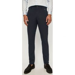 Marciano Guess - Spodnie. Niebieskie spodnie męskie MARCIANO GUESS, na co dzień, z aplikacjami, z elastanu. Za 549,90 zł.