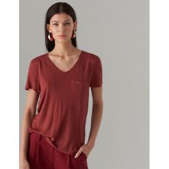 Koszulka oversize z kieszonką - Pomarańczo. Szare koszulki damskie Mohito, s, bez wzorów, bez kołnierzyka, bez rękawów. Za 39,99 zł.