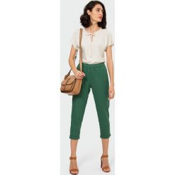 Lniane spodnie 7/8. Spodnie damskie Greenpoint, z wiskozy. Za 119,99 zł.