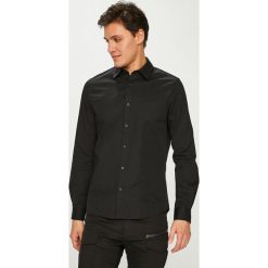 Calvin Klein Jeans - Koszula. Czarne koszule męskie marki Calvin Klein Jeans, xl, z bawełny, klasyczne, z klasycznym kołnierzykiem, z długim rękawem. Za 299,90 zł.