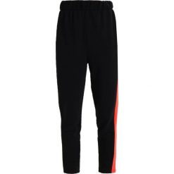 Spodnie dresowe damskie: TWINTIP Spodnie treningowe black