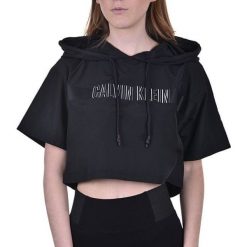 Calvin Klein Damska bluza z kapturem Cropped Hodie KW0KW00717 -094 PVH Black (rozmiar L). Czarne bluzy damskie Calvin Klein, l, bez wzorów, bez rękawów, z kapturem. W wyprzedaży za 197,00 zł.