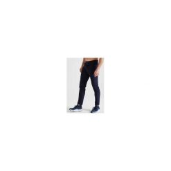 Spodnie fitness cardio męskie FPA 500 granatowe. Niebieskie spodnie męskie DOMYOS, xl, bez wzorów, z elastanu, sportowe. Za 79,99 zł.