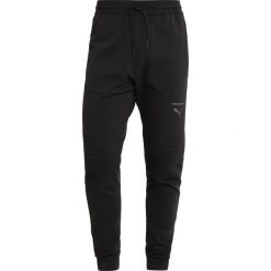 Puma PACE MOVE PANTS Spodnie treningowe black. Czerwone spodnie dresowe męskie marki Puma, xl, z materiału. Za 509,00 zł.