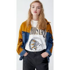 Koszulka vintage z rysunkiem. Koszulki damskie Pull&Bear, bez wzorów, vintage, bez kołnierzyka. Za 49,90 zł.