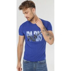 Niebieska Koszulka Doriatina. Niebieskie koszulki męskie Born2be, xl, bez wzorów, bez kołnierzyka, bez rękawów. W wyprzedaży za 29,99 zł.