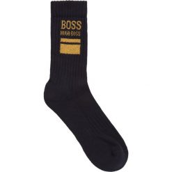 Skarpety wysokie męskie Boss Qs Rib Black Logo 50441218. Niebieskie skarpetki męskie Boss, bez wzorów. Za 49,00 zł.