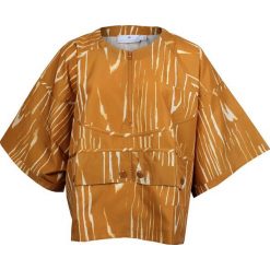 Topy sportowe damskie: Adidas Koszulka damska Stella McCartney Run Nylon Tee pomarańczowa r. L (M61152)