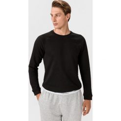 Calvin Klein Bluza Czarny. Czarne bluzy damskie Calvin Klein, m, bez wzorów, z bawełny, bez rękawów, bez kaptura. Za 256,95 zł.