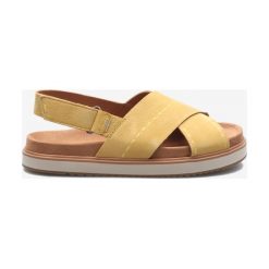 TOMS Sandały Żółty. Żółte sandały damskie Toms, w paski, ze skóry, bez obcasa, z paskami. Za 507,95 zł.