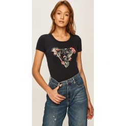 Guess Jeans - T-shirt. Niebieskie bluzki damskie Guess Jeans, s, z nadrukiem, z elastanu, casualowe, z okrągłym kołnierzem, z krótkim rękawem. W wyprzedaży za 129,90 zł.