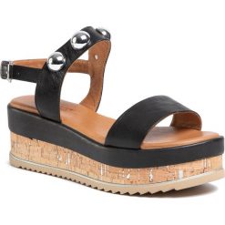 Sandały INUOVO - 126010 Black. Czarne klapki damskie Inuovo, bez wzorów, ze skóry, bez obcasa, na koturnie. W wyprzedaży za 269,00 zł.