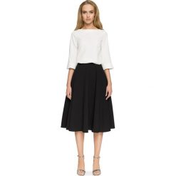 RACHELE Rozkloszowana spódnica z kontrafałami - czarna. Czarne spódniczki damskie Stylove, na co dzień, s, bez wzorów, z elastanu, eleganckie, rozkloszowane. W wyprzedaży za 99,00 zł.